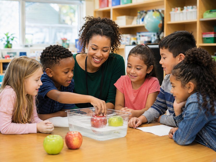 Pre-K children doing a hands-on science activity
